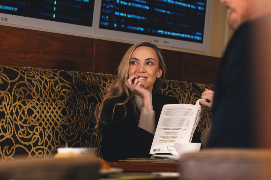 A woman reading a book.