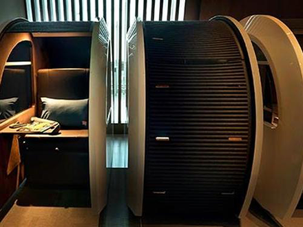 Private luxury sleep pods in Priority Pass lounge Dubai.